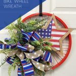 red, white, and blue stripe and polka dot bow with red bike wheel