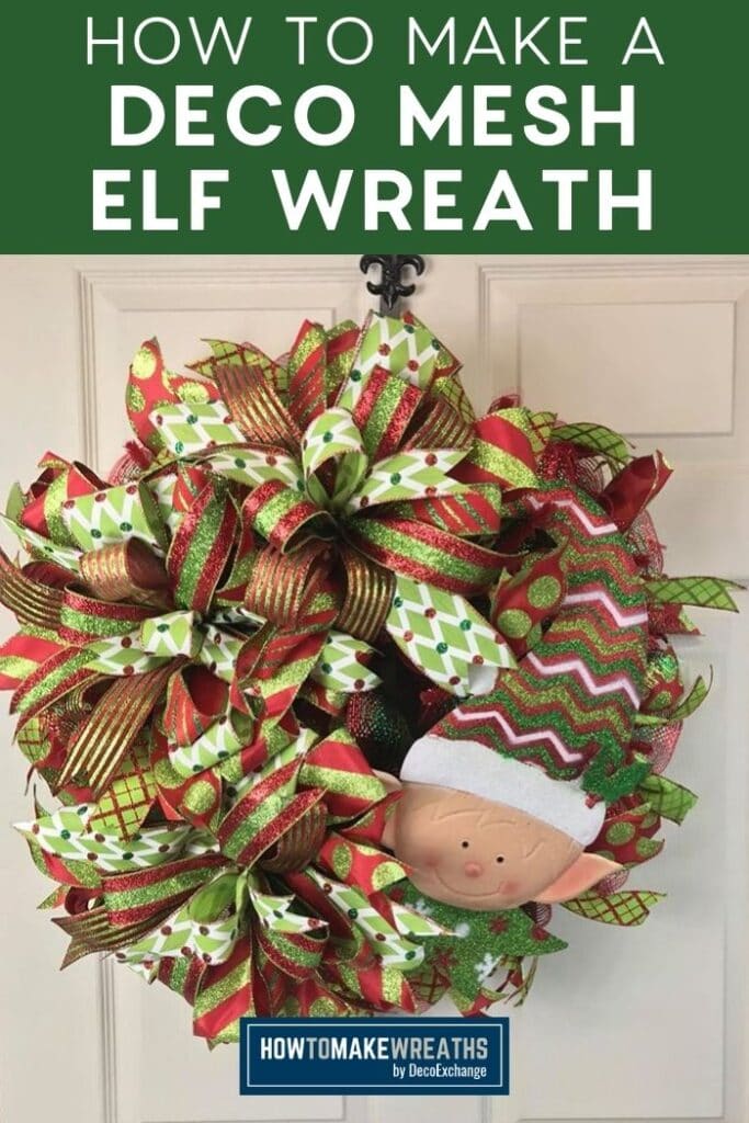 Christmas ribbon and mesh with elf sign on a wreath on a front door