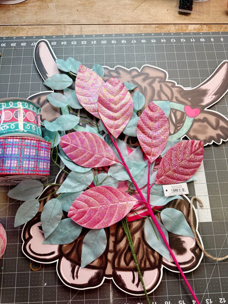 Door hanger supplies on a cutting mat