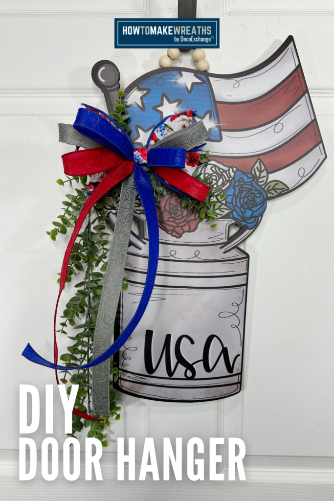 Water can shaped door hanger with American flag customized with simple bow.