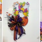 Large door hanger with 3 ghosts sitting on a pumpkin with a bow and floral embellishment.
